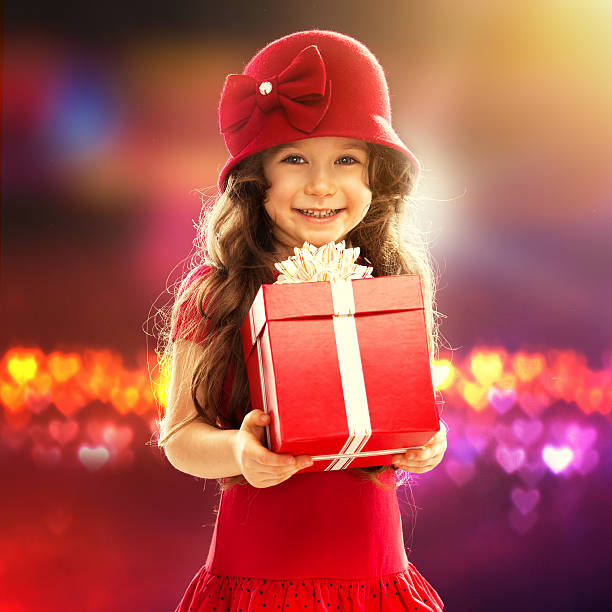 istock Little girl with rose 465914175