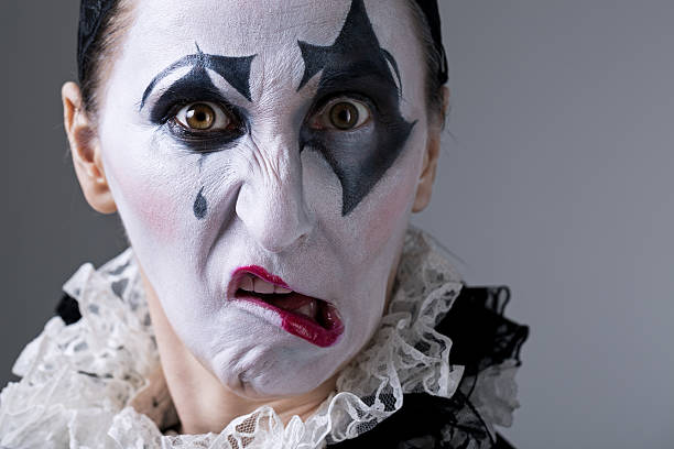 istock Woman in disguise harlequin 465914918