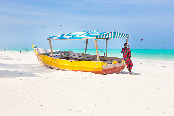 istock White tropical sandy beach on Zanzibar. 465917766