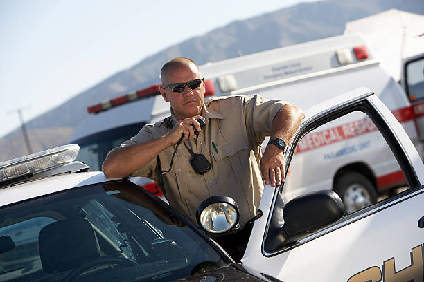 istock Police Officer on Two-Way Radio 465918894