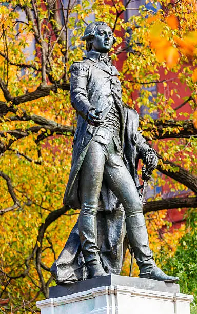 General Marquis de Lafayette Statue Lafayette Park Autumn Washington DC. In American Revolution General Lafayette was an officer in the American Revolution and personal friend of General Washington.  Statue was dedicated in 1891 as a reaffirmation of French American relations.  Artist Sculptor Jean Falguiere.