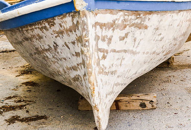 istock Rowboat on the ground for repair 465922556