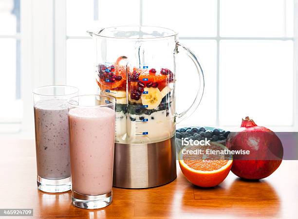 Making Smoothies In Blender With Fruit And Yogurt Stock Photo - Download Image Now - Making, Milkshake, Juice - Drink