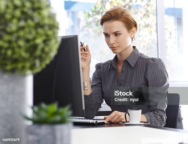 Attractive Businesswoman Working With Computer Stock Photo - Download Image Now - 20-24 Years, 20-29 Years, Adult