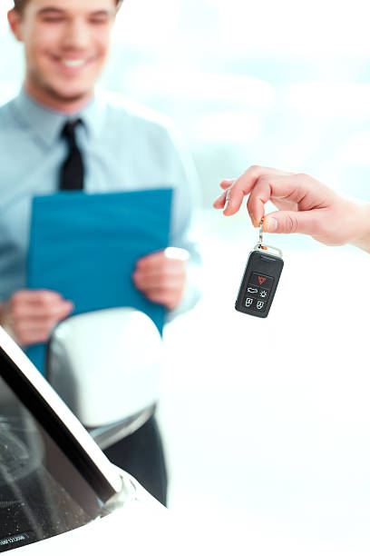 istock Handsome young man in dealership 465927294