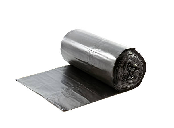 istock roll of disposable trash bags isolated over white background Sto 465930328