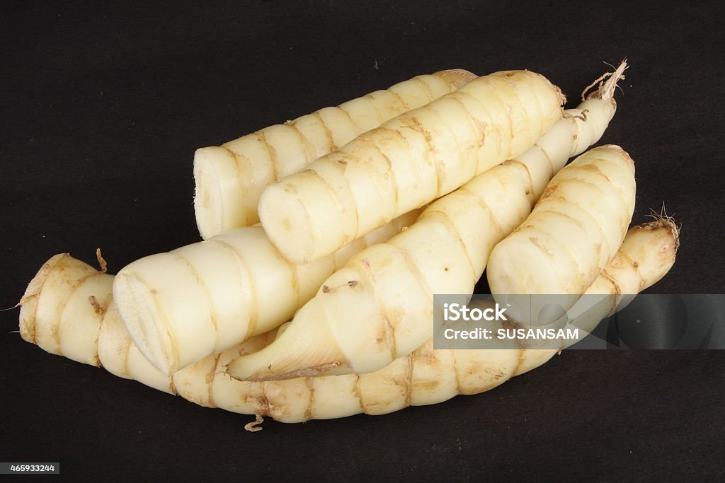 Fresh arrowroot. Fresh organic arrowroot in black background. 2015 Stock Photo