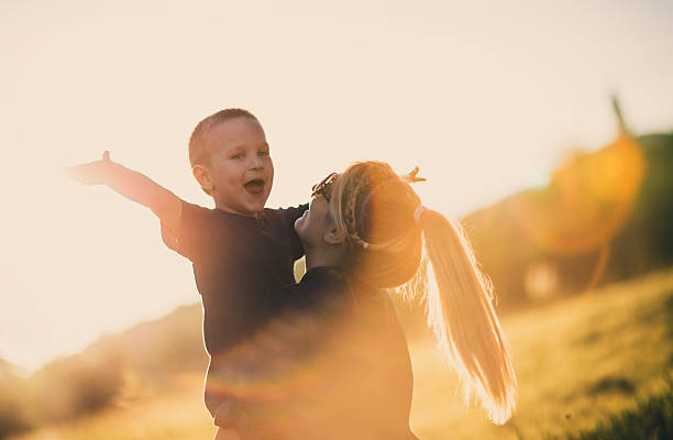 istock Mother and son embracing on a sunny day 465938682