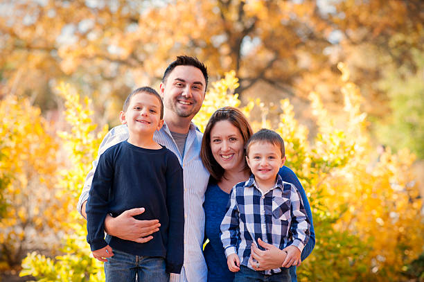 istock Couple with two young children 465940095