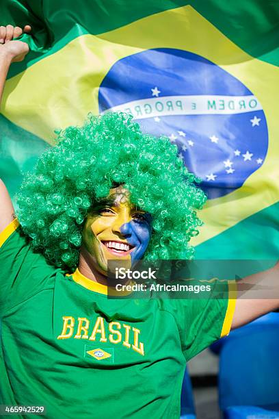 Brazilian Football Fan Waving A Flag Stock Photo - Download Image Now - Fan - Enthusiast, Face Paint, Brazil