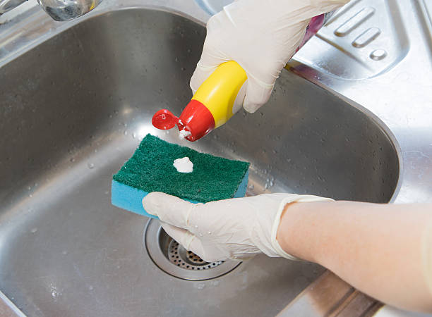 istock Homework. Cleaning of the kitchen sink 465944104