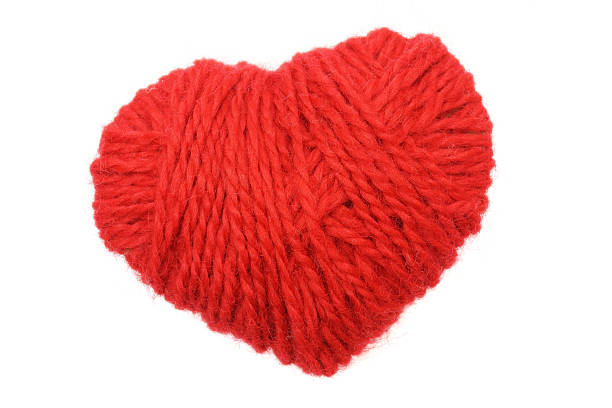 istock Yarn of wool in heart shape symbol 465944707
