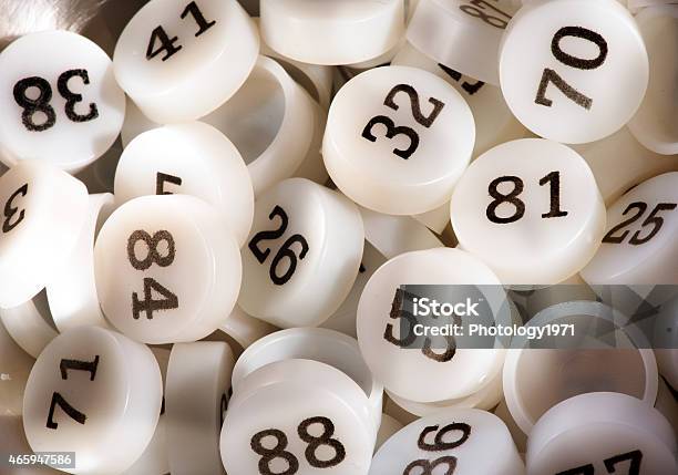 Plenty Of White Plastic Bingo Game Numbers Stock Photo - Download Image Now - Bingo, Number, 2015