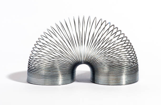 istock Glossy Metal Spring Isolated on White Background 465947594