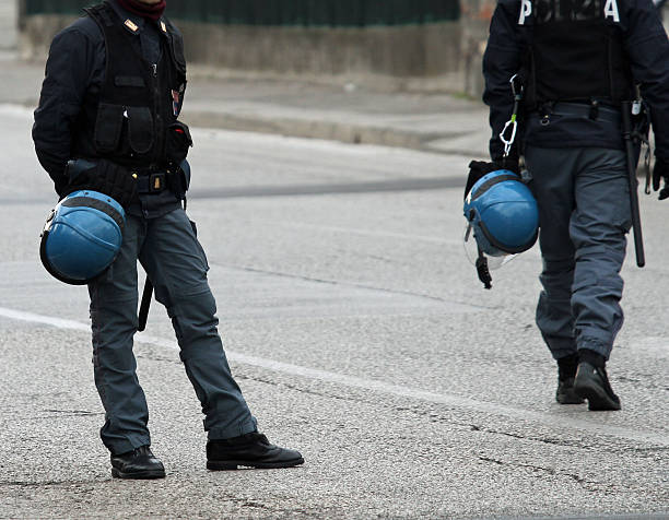 istock policemen on patrol in the road 465947785
