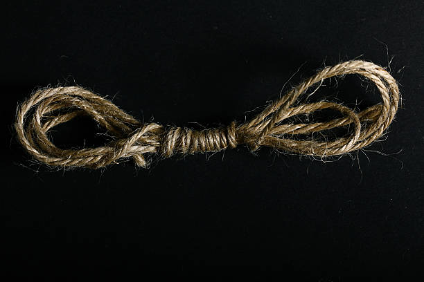 istock twine on black background skein 465948476