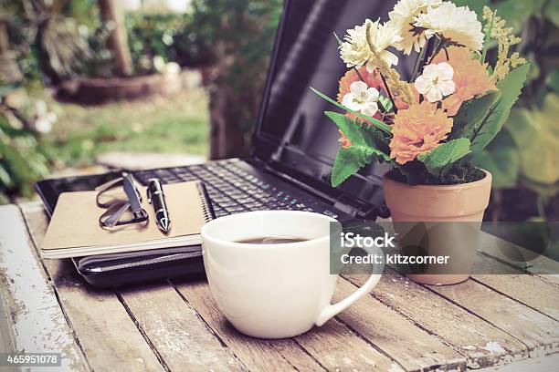 Arrangement Of Outdoor Work Station With Laptop Coffee Stock Photo - Download Image Now