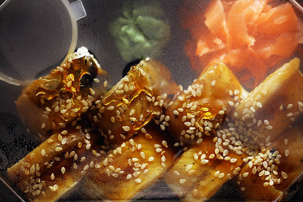 delivery service Japanese food rolls in plastic box