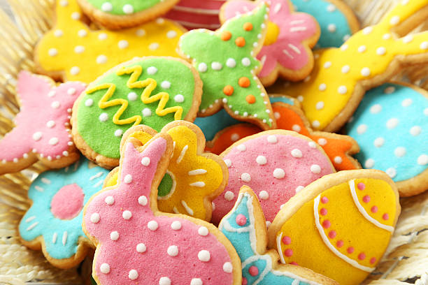 Colorful easter cookies in basket stock photo