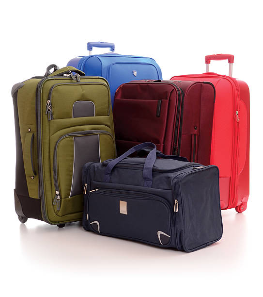 istock Luggage consisting of large suitcases isolated on white 465960357