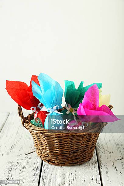 Easter Eggs In Basket On White Wooden Background Stock Photo - Download Image Now - 2015, Abstract, Animal Markings