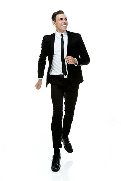 istock Cheerful businessman running and looking away 465961134