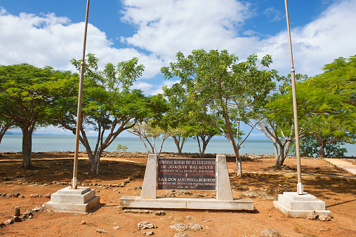 Puerto Plata, Dominican Republic - November 03, 2012: Memorial plaque at the ruins of La Isabella settlement on November 03, 2012 in Puerto Plata, Dominican Republic. La Isabella was founded by Christopher Columbus in 1493.