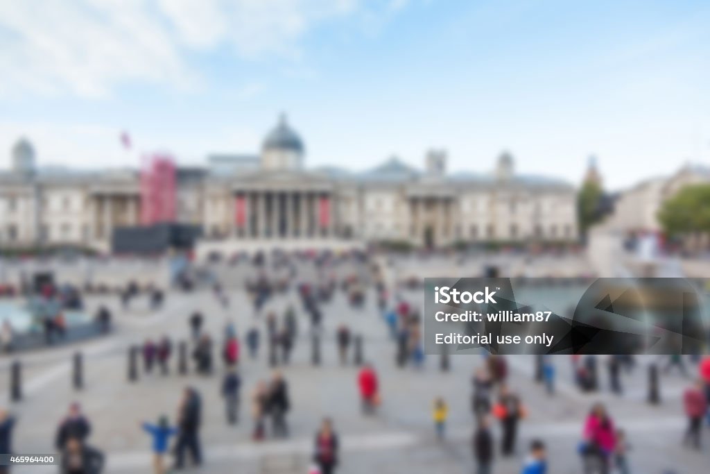 Crowded Trafalgar Square with National Gallery, blurred backgrou London, United Kingdom - October 30, 2013: Crowded Trafalgar Square with National Gallery on Background 2015 Stock Photo