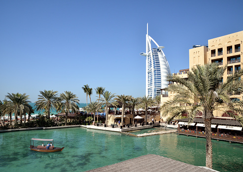 Dubai, UAE - January 16, 2015: Madinat Jumeirah Arabian Resort in Dubai, UAE. It is the largest resort in Dubai, spreading across 40 hectares of landscapes and gardens.
