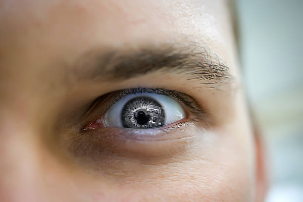 istock Serious sad and angry looking man with grey eye 465967384