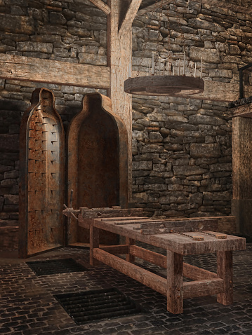 Old medieval torture chamber with a table and tools