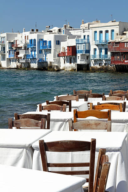 istock View of Mykonos across dining tables 465973912