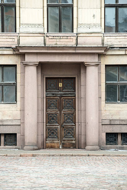 architectural street building front details in riga, latvia