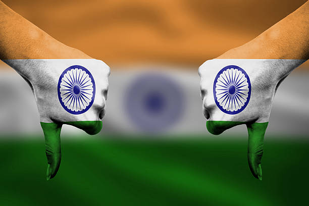 istock failure of India - hands gesturing thumbs down 465977358