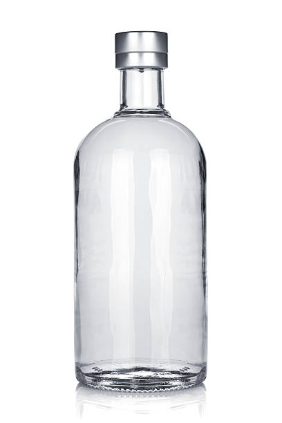 Bottle of russian vodka Bottle of russian vodka. Isolated on white background wet bottle stock pictures, royalty-free photos & images