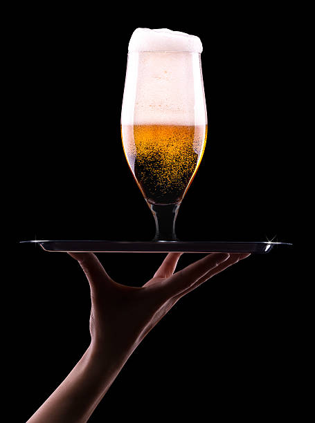 istock Beer into glass on a black 465980163