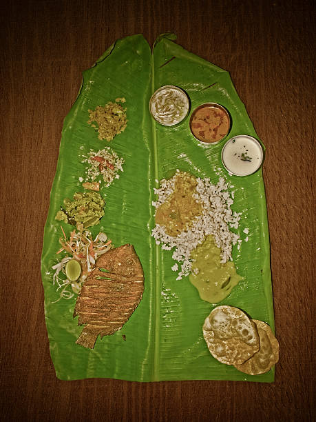 South Indian Thali (meals) with fish served traditionally on ban