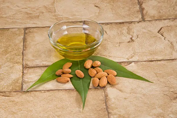 Almonds with Oil and GreenLeaves