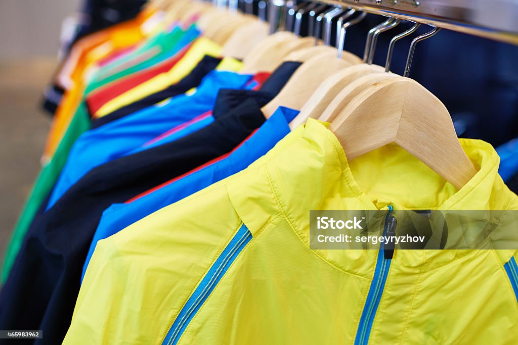 Sportswear on hangers in store Sportswear on a hanger in the store Sports Clothing Stock Photo