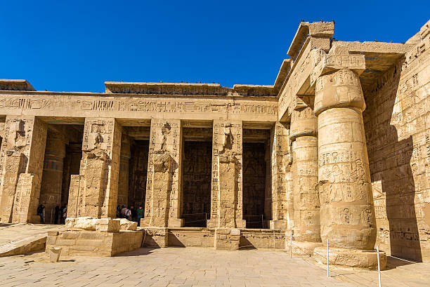 istock Ancient columns in the Medinet Habu Temple - Egypt 465984102