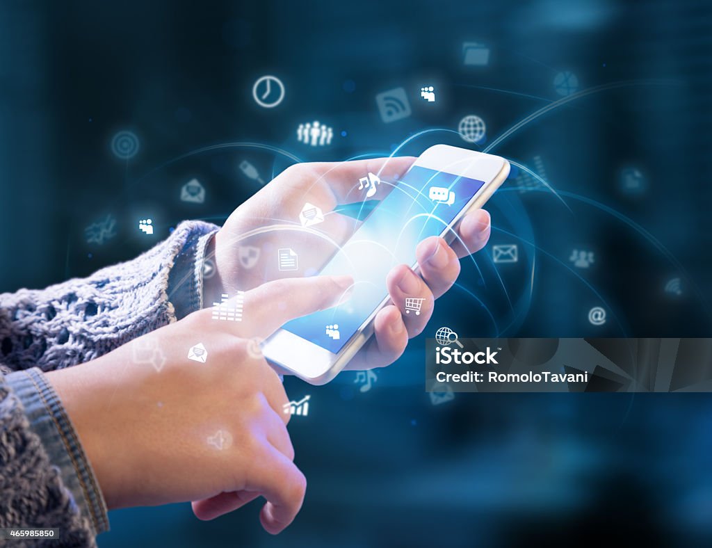 multitasking in hands functions of a smartphone at hand Online Messaging Stock Photo