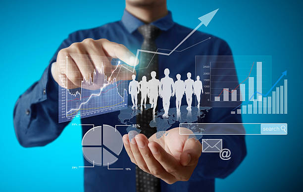 istock Businessman with financial symbols 465986846