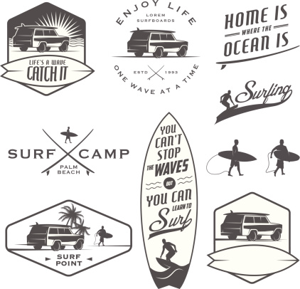 Set of vintage surfing labels, badges and design elements.