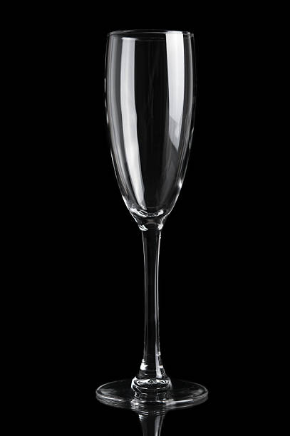 istock Champagne empty glass isolated on black background 465987818