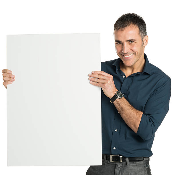Happy Businessman Holding A Blank Sign