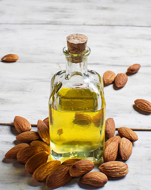 istock Glass bottle with almond oil 465988818