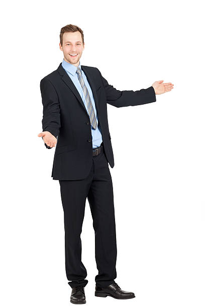 istock A young businessman with his arms outstretched 465989351