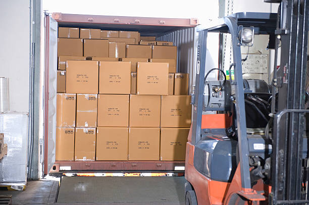 istock Boxes And Forklift Truck In Warehouse 465992656