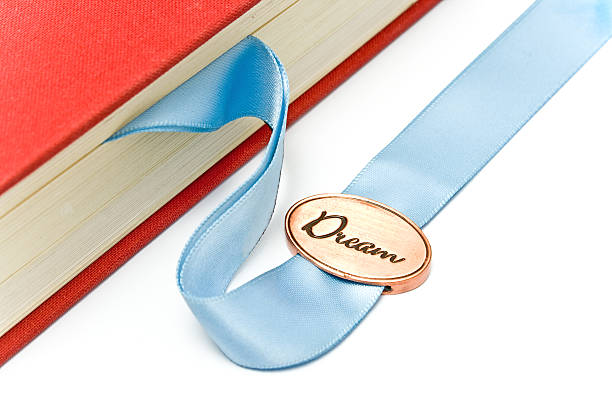 istock Bookmark in a book isolated on white 465999176