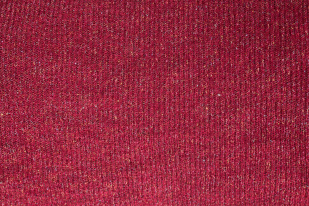 istock Texture of dark red wool fabric with multicolored shiny thread 466000204